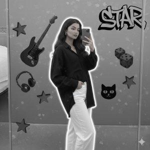 Ultra-realistic 8K cinematic portrait of a stylish young girl taking a mirror selfie, wearing a loose black shirt and white pants. Minimal jewelry, soft white glow, modern grayscale collage background with guitar, dice, cat face, 3D stars, and ‘STAR’ graffiti — artistic monochrome Gemini aesthetic.