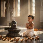 Ultra-realistic 8K cinematic photo of a baby boy kneeling beside a glowing Shiva Lingam during evening aarti inside a temple, wearing a cream dhoti and tulsi mala, hands folded in prayer with warm oil lamp light and sacred incense smoke.