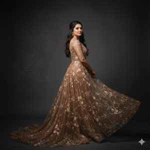 Hyper-realistic fine-art fashion portrait of a woman standing sideways, turning her head toward the camera with a calm, mysterious expression, wearing a flowing floor-length sheer chiffon soft brown gown with delicate embroidered floral motifs and subtle shimmer, the fabric trailing softly across the floor, accentuating her silhouette.