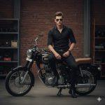 Ultra-realistic 8K cinematic portrait of a stylish young man standing beside a black Royal Enfield motorcycle in a moody industrial warehouse. Dressed in a fitted black shirt, jeans, and boots, with sunglasses and a confident pose. Soft lighting and blurred brick wall background create cinematic depth and realism.